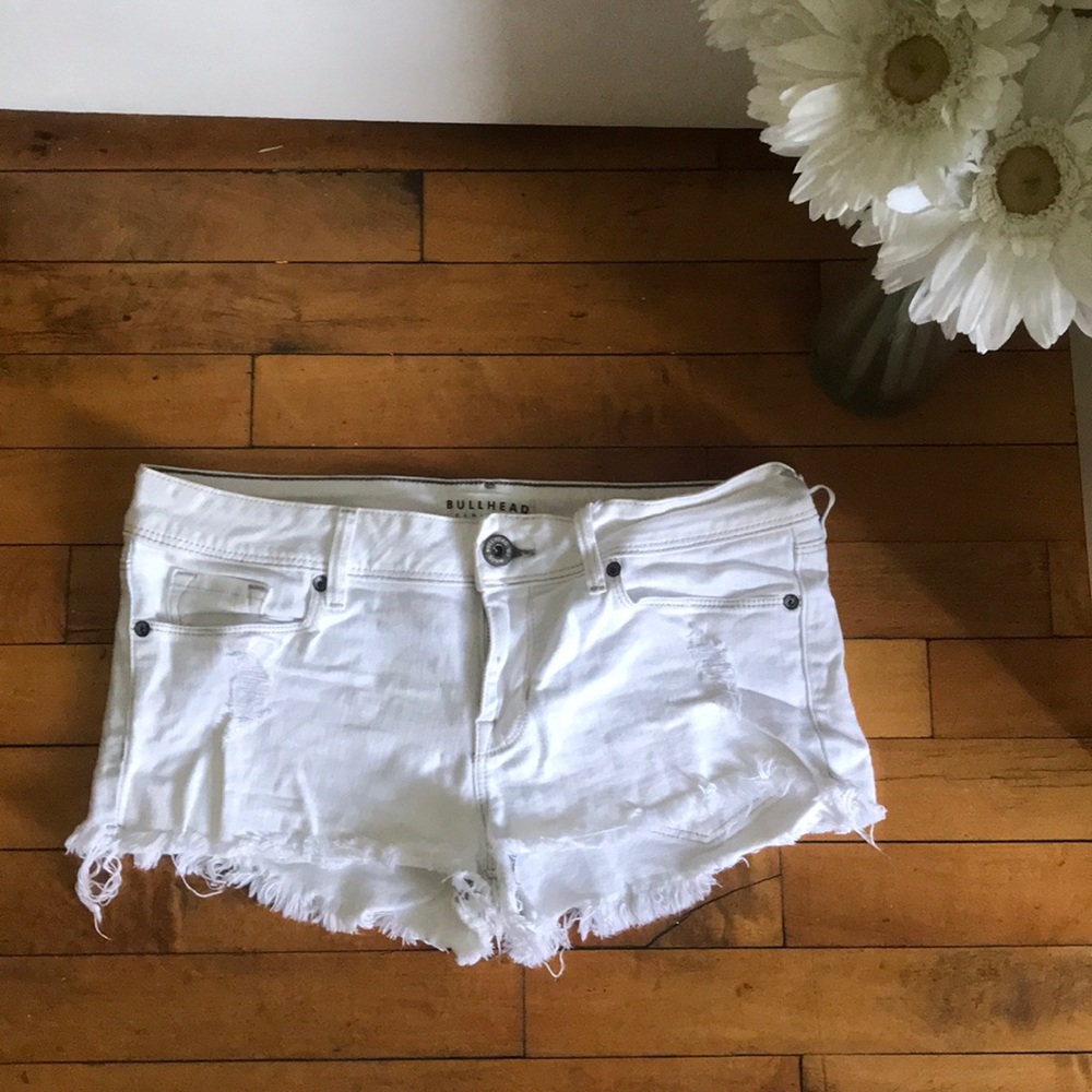 White distressed denim shorts
